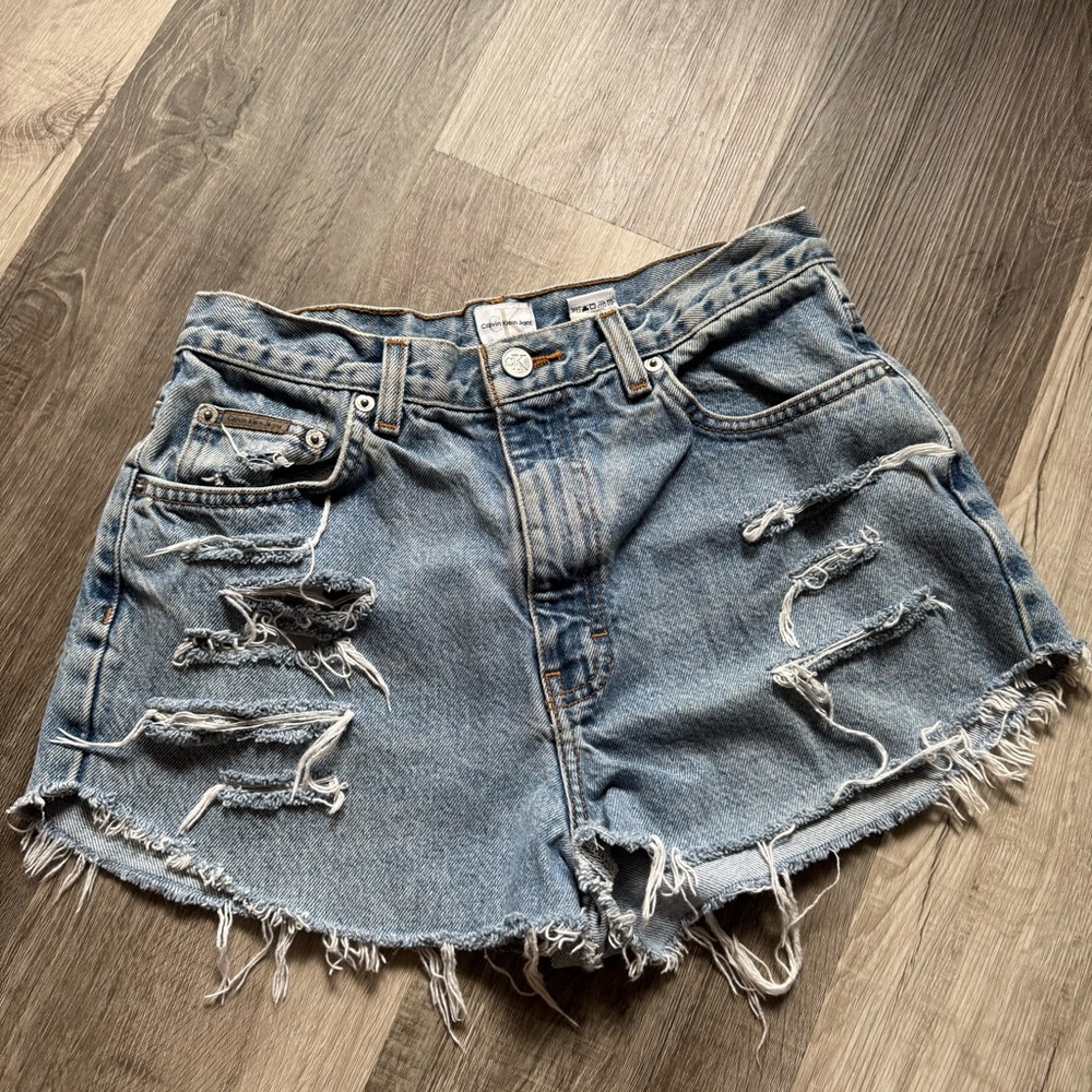 Calvin Klein distressed denim shorts